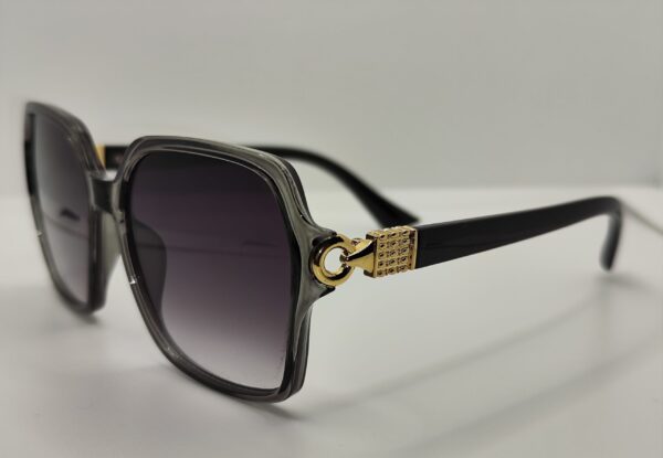 Gafas de sol gris y dorado